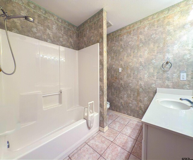 1202 Rice Rd, Road, Tyler, TX 75703 - bathroom featuring wallpapered walls, tile patterned floors, baseboards, vanity, and toilet
