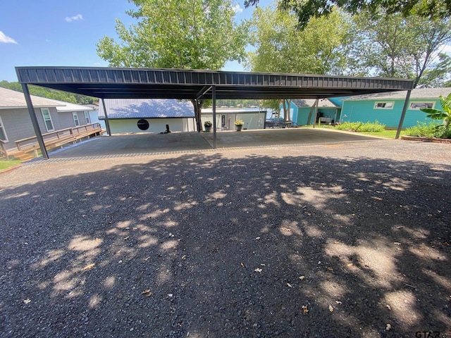 view of car parking with a carport