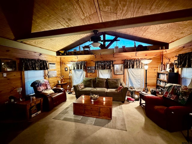 interior space featuring plenty of natural light, wooden walls, and beam ceiling