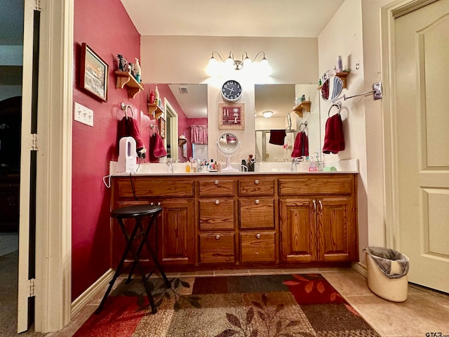 bathroom with vanity and tile patterned floors