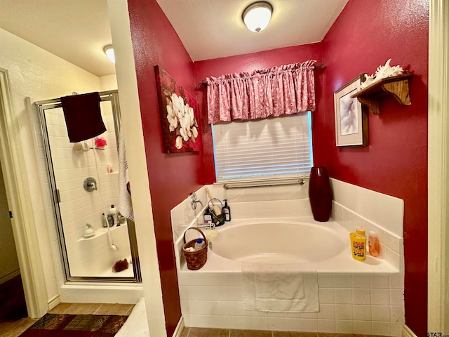 bathroom featuring plus walk in shower