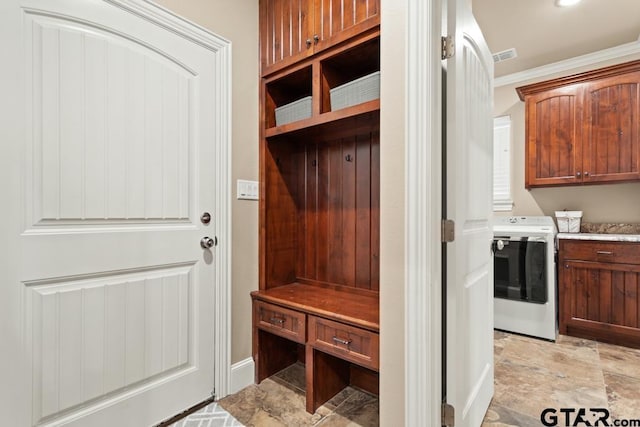 mudroom featuring crown molding and washer / clothes dryer