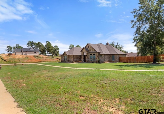 view of front facade featuring a front lawn