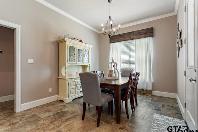 dining space featuring crown molding and an inviting chandelier