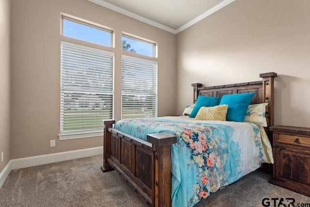 carpeted bedroom with crown molding