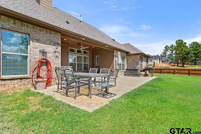 view of patio featuring ceiling fan