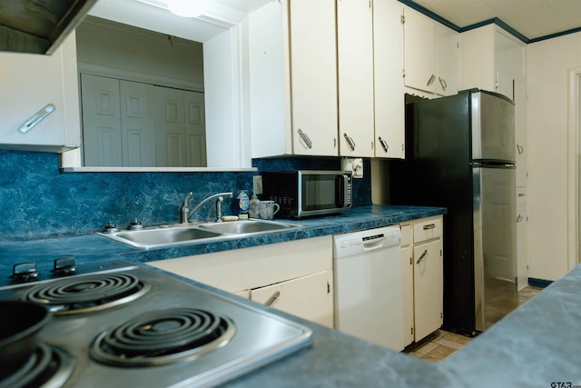 kitchen with decorative backsplash, stove, dishwasher, white cabinets, and sink