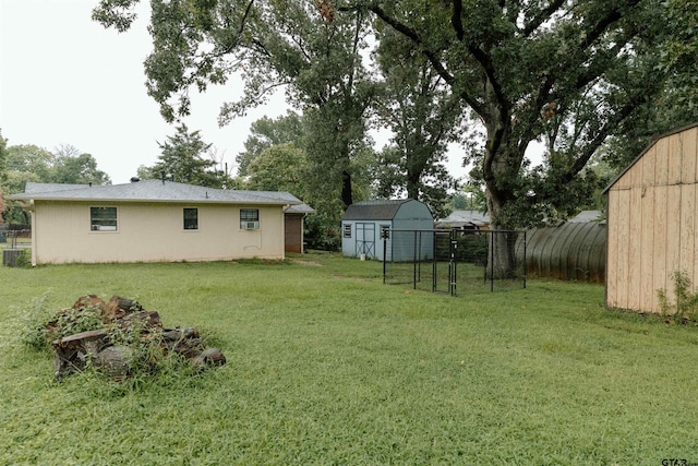 view of yard with a storage unit