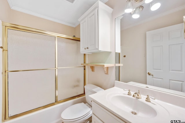 full bathroom with vanity, toilet, ornamental molding, and bath / shower combo with glass door