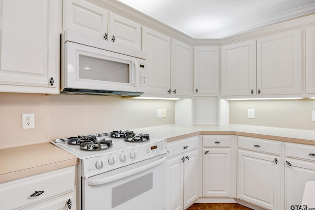 kitchen with white cabinets and white appliances