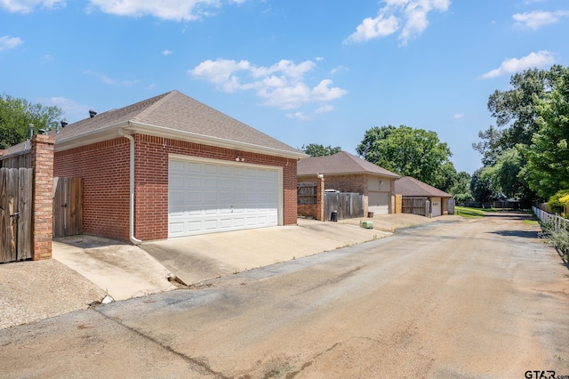 single story home featuring a garage