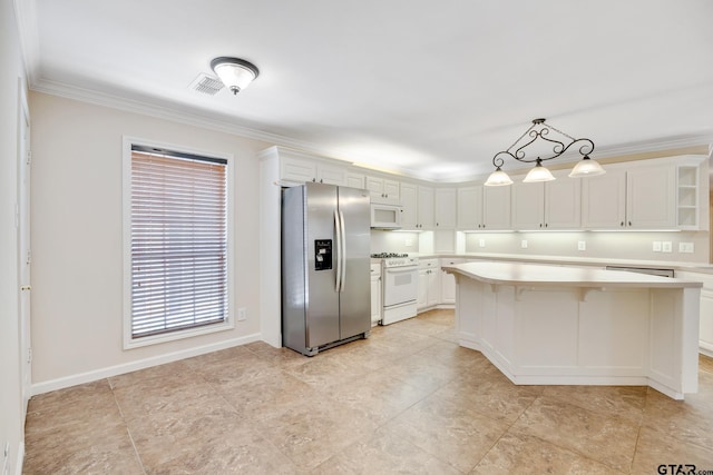 kitchen featuring a center island, white appliances, crown molding, decorative light fixtures, and white cabinetry