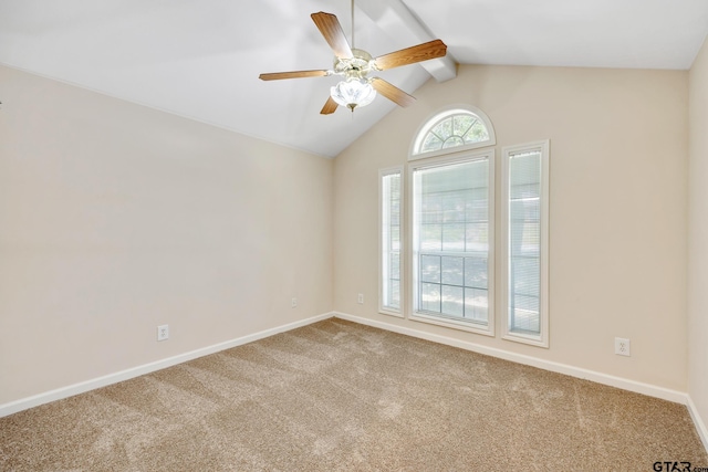 carpeted spare room with vaulted ceiling with beams and ceiling fan