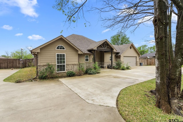 607 Main St, Bullard, TX 75757 - view of front of property featuring brick siding, concrete driveway, fence, and a shingled roof
