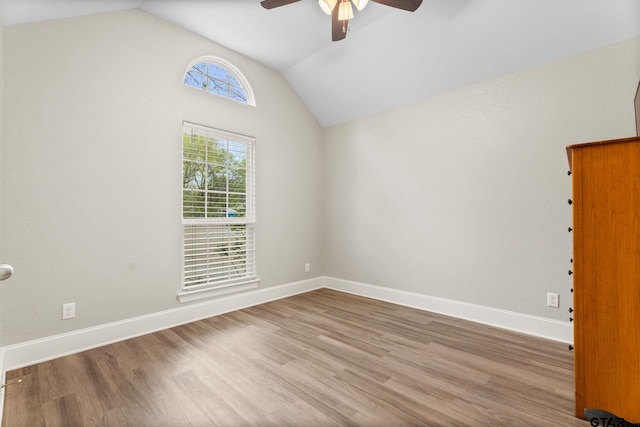 607 Main St, Bullard, TX 75757 - unfurnished room featuring a ceiling fan, lofted ceiling, wood finished floors, and baseboards