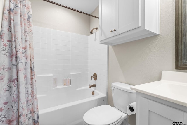 607 Main St, Bullard, TX 75757 - full bathroom featuring a textured wall, shower / bath combination with curtain, vanity, and toilet