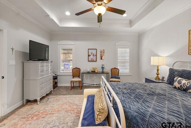 4133 Colina Trl, Tyler, TX 75707 - bedroom featuring a tray ceiling, ornamental molding, ceiling fan, and carpet floors