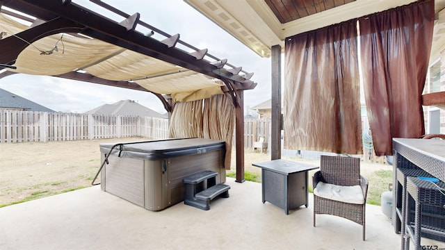 view of patio with a pergola and a hot tub