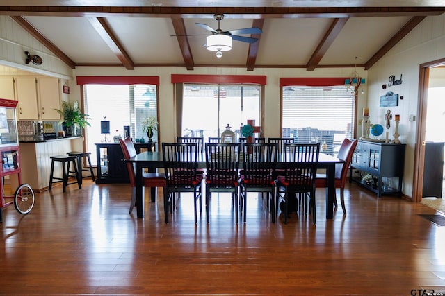 dining area featuring lofted ceiling with beams, ceiling fan, and dark wood-style flooring