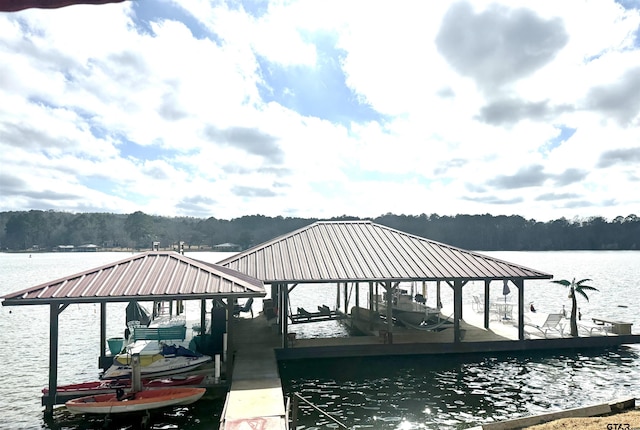 view of dock with a water view