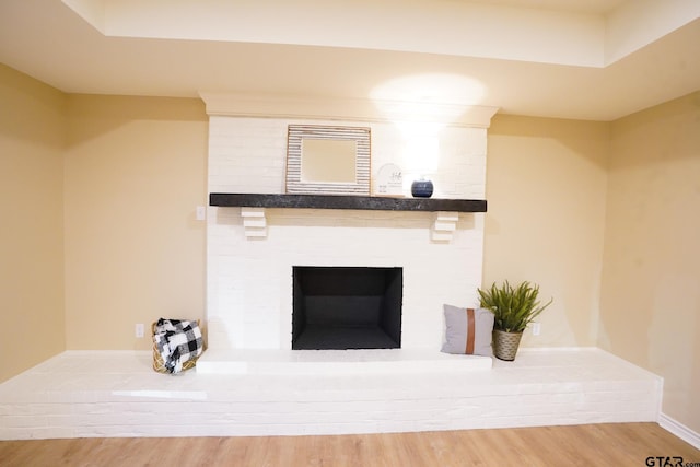 1370 Fm 315, Palestine, TX 75801 - detailed view of wood finished floors, a brick fireplace, and baseboards