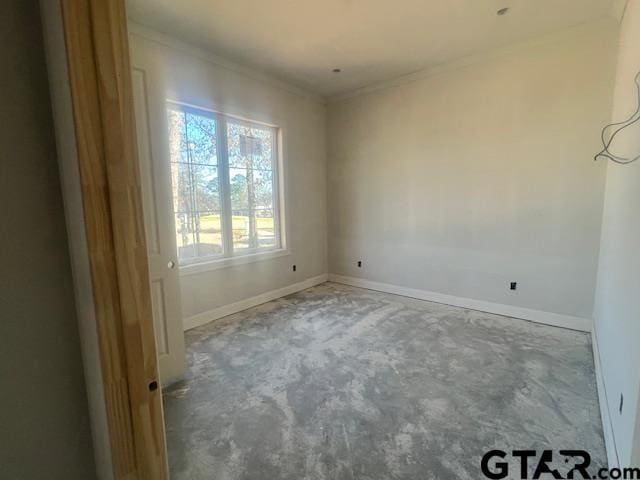 spare room with ornamental molding