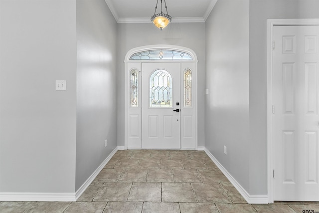 entryway featuring ornamental molding