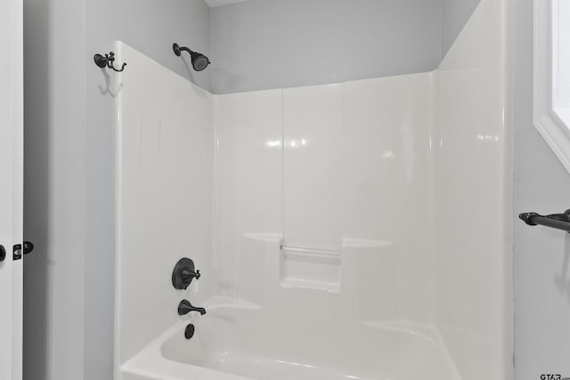 bathroom featuring shower / bath combination