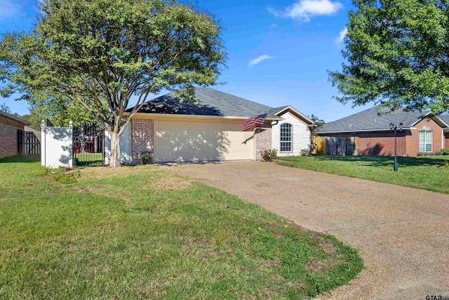 ranch-style home featuring a garage and a front lawn