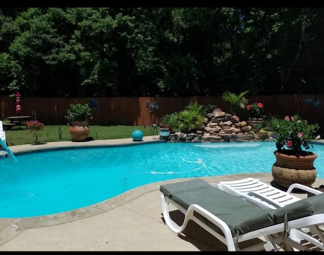 view of pool with a fenced in pool and a fenced backyard