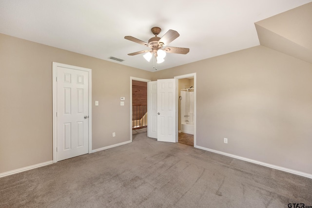 22886 County Road 422, Lindale, TX 75771 - unfurnished bedroom with carpet flooring, a ceiling fan, and connected bathroom