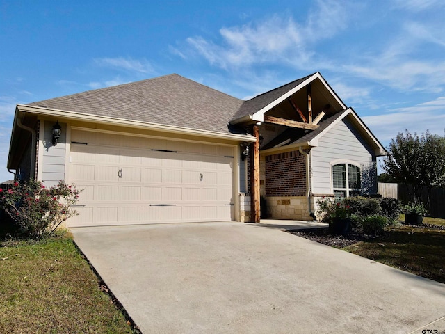 ranch-style home with a garage