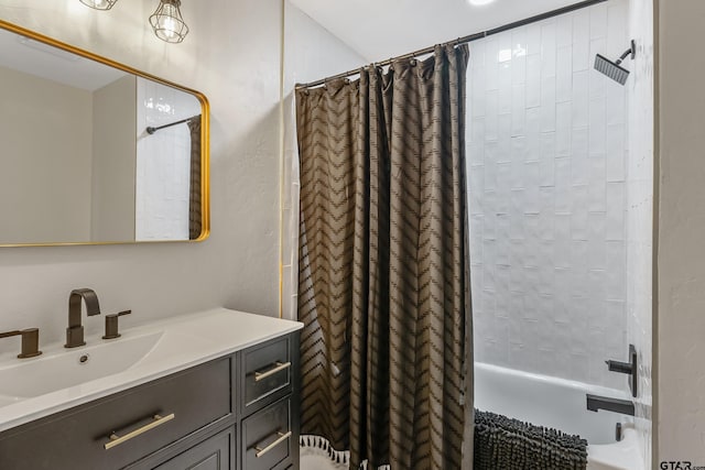 full bathroom featuring shower / bath combination with curtain and vanity