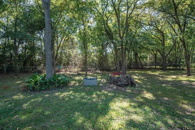 924 Bradley Dr, Athens, TX 75751 - view of yard with a view of trees and a fenced backyard