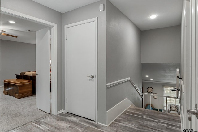 924 Bradley Dr, Athens, TX 75751 - stairway featuring a ceiling fan, baseboards, and wood finished floors