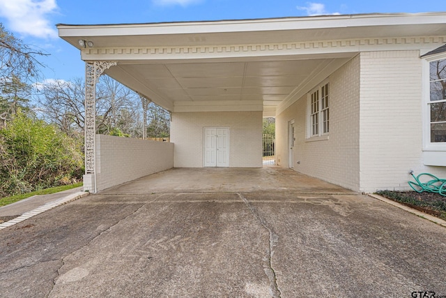 view of car parking with a carport