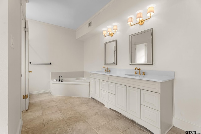 bathroom with a washtub and vanity