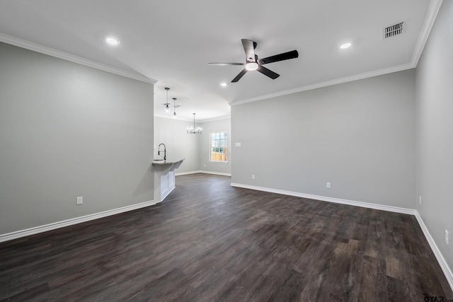 unfurnished living room with sink, dark wood-type flooring, ceiling fan with notable chandelier, and ornamental molding