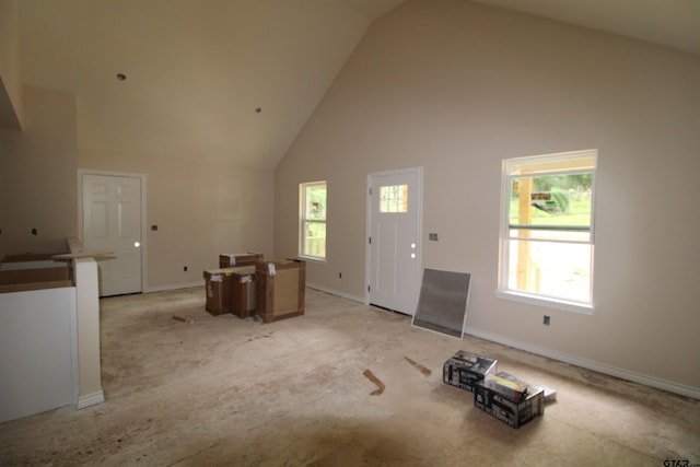 16954 Deer Run Rd, Flint, TX 75762 - unfurnished living room with high vaulted ceiling and light colored carpet
