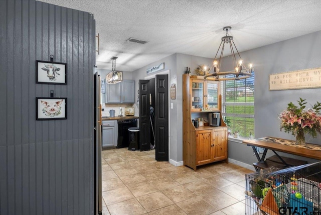 12305 Pine St, Larue, TX 75770 - kitchen with dishwasher, baseboards, a chandelier, and visible vents