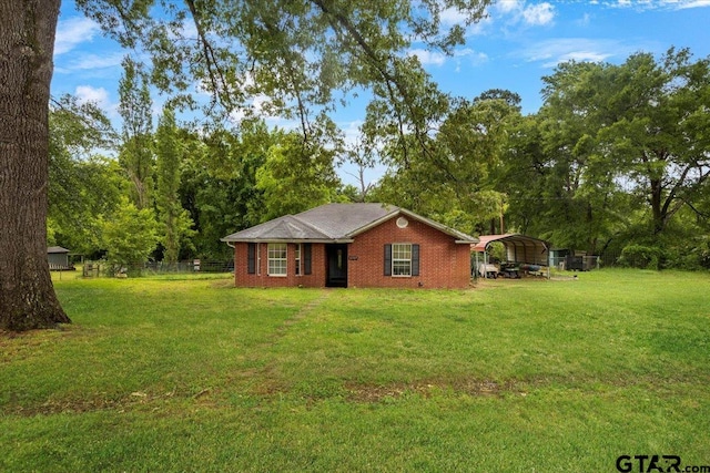 12305 Pine St, Larue, TX 75770 - exterior space with a front lawn, brick siding, fence, and a detached carport