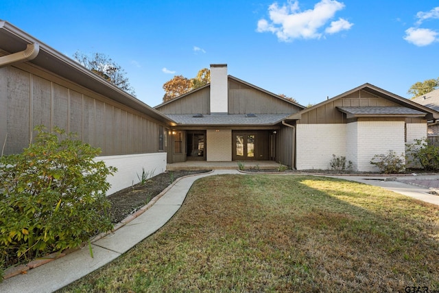 exterior space with a front yard