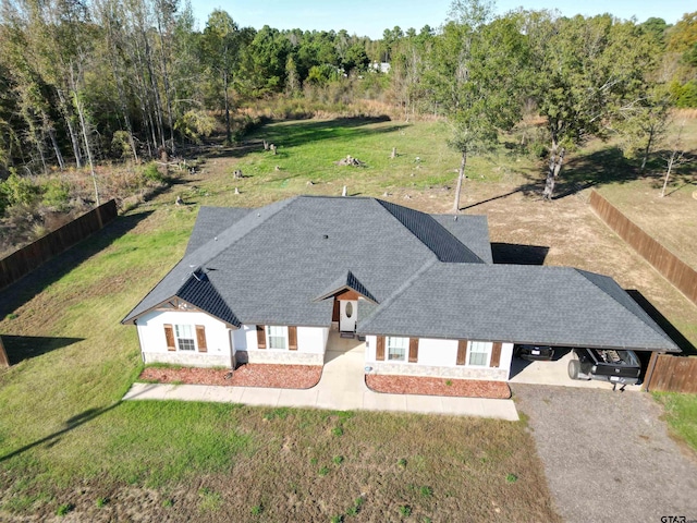 back of property featuring a yard and a patio