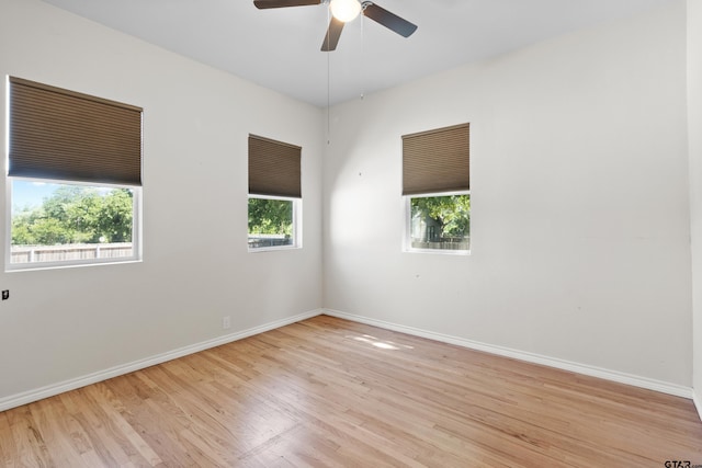 4456 Fm 2767, Tyler, TX 75708 - spare room featuring light wood finished floors, baseboards, and ceiling fan