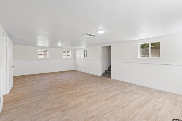 4456 Fm 2767, Tyler, TX 75708 - basement featuring stairway, visible vents, and light wood-style floors