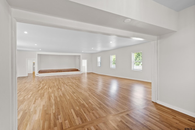 4456 Fm 2767, Tyler, TX 75708 - unfurnished living room with light wood finished floors, baseboards, and recessed lighting