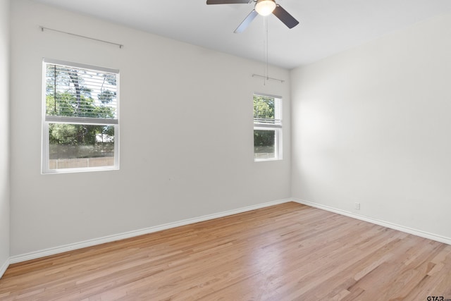 4456 Fm 2767, Tyler, TX 75708 - empty room with baseboards, a ceiling fan, and light wood-style floors