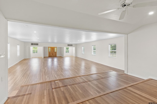 4456 Fm 2767, Tyler, TX 75708 - unfurnished living room featuring wood finished floors, ceiling fan, healthy amount of natural light, baseboards, and recessed lighting