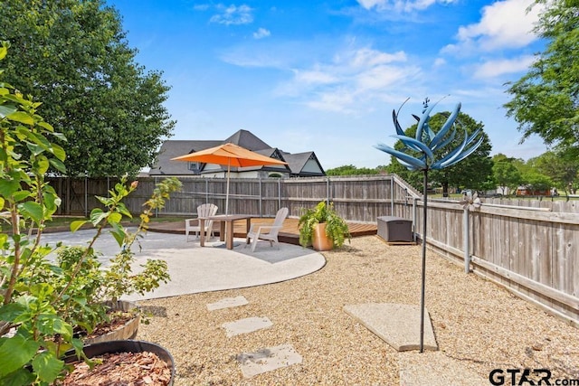 view of yard featuring a fenced backyard and a patio area
