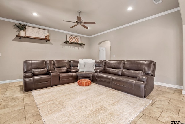 cinema with ornamental molding and ceiling fan